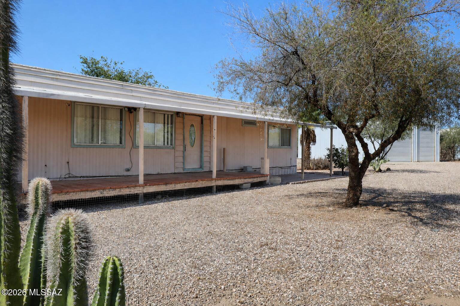 28' x 56' Coronado manufactured home on over an acre of fully fenced land. Approximately 1,568 sq. ft. with 3 bedrooms and 2 bathrooms. Manufactured by NTAFCO and built to Federal Manufactured Home Construction and Safety Standards. Features a 2022 Goodman HVAC system and a screened-in back porch. Home needs TLC and is ready for updates.

The property also includes a newer 50' x 30' METAL RV and STORAGE BUILDING with electricity, two roll-up doors and multiple storage levels. Separate workshop/tack room provides additional work and storage space.