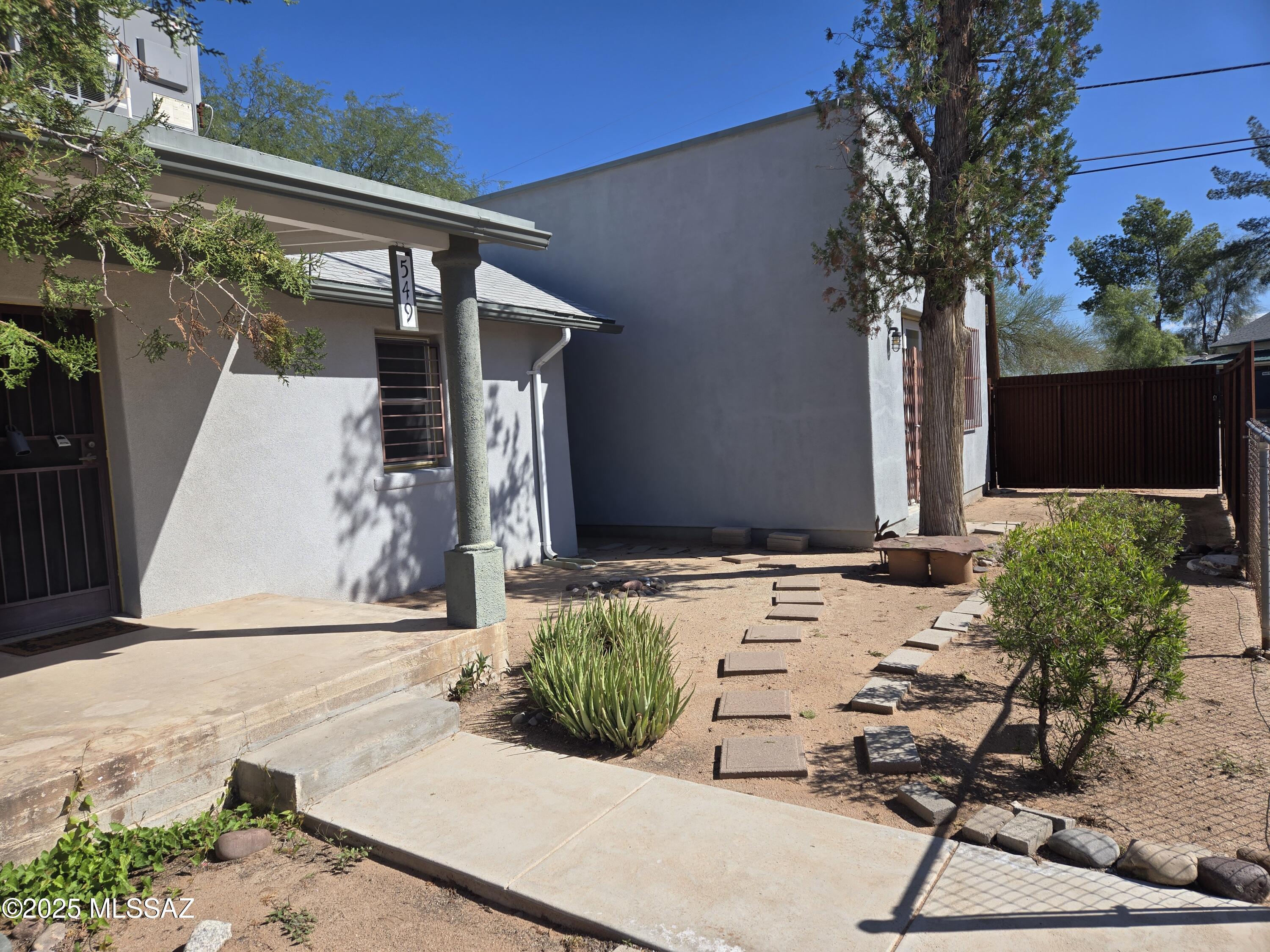 This home is nestled in the sought after  
Manlove Neighborhood. Great location and that is close to Downtown and the U of A. This 2bd 1 1/2 ba layout has many options. Very charming with original wood flooring and  a lot of character. There is an addition to the home that is 744 sq ft and used for BD #2. This area can be multi purpose adding more bedrooms, Art Studio, Office/Business etc... Has separate heating and cooling.
Large lot that is zoned R2. This zoning may allow for an additional home on the property. Many properties have done so in the neighborhood. Very private yet close to everything. No HOA.
Must see to appreciate