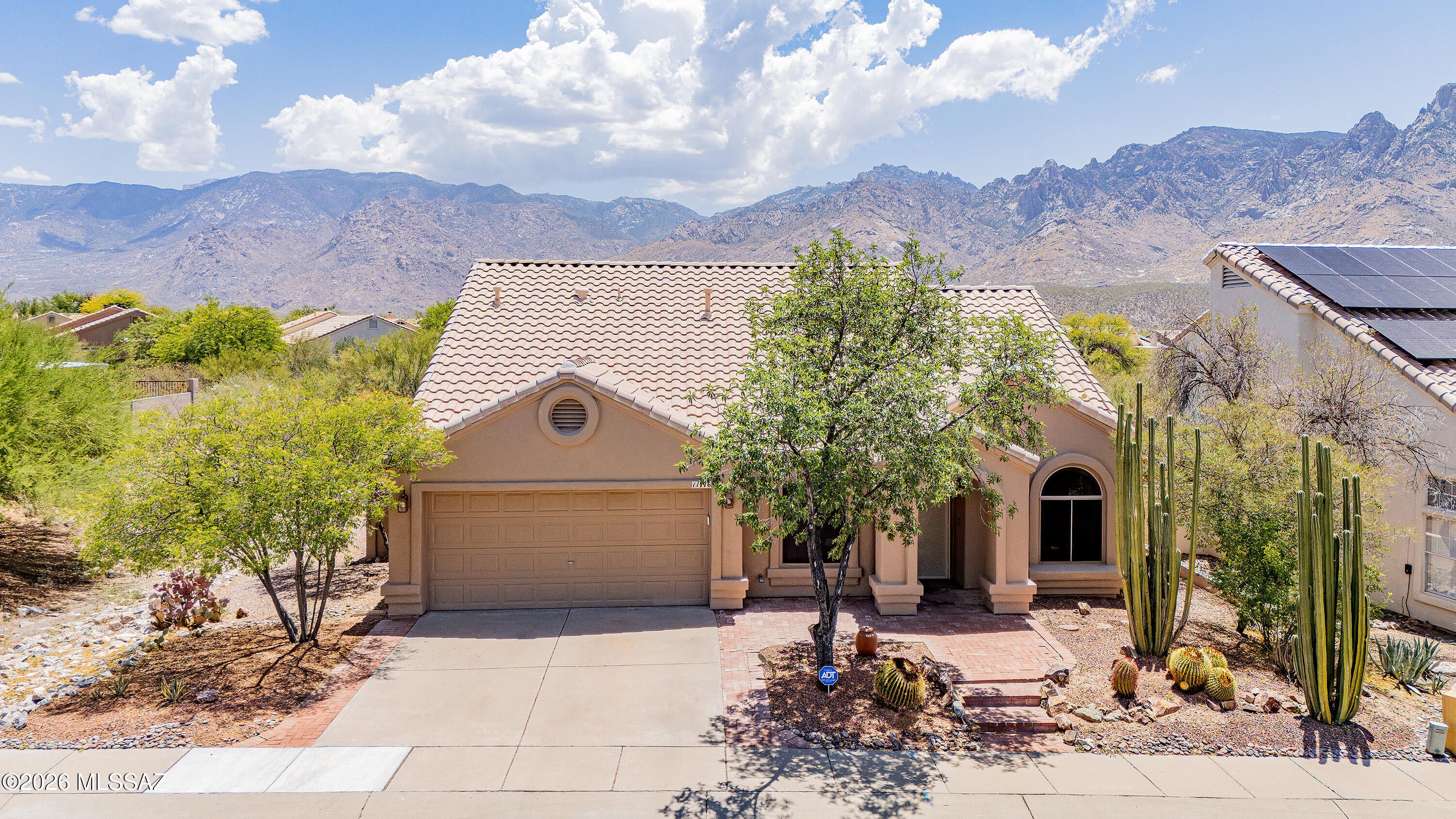 Nestled in the highly sought-after Catalina Shadows neighborhood of Oro Valley. Perfectly positioned on one of the community's premier homesites, the property backs to open space, providing unobstructed Catalina Mountain views and a peaceful setting. The low-maintenance backyard is designed for relaxing and entertaining. Two mature citrus trees, a covered patio, and a cozy outdoor gas fireplace create the perfect place to unwind while watching the Santa Catalina Mountains glow with vibrant sunset colors. This beautifully maintained 3-bedroom, 2 bath home offers an exceptional combination of comfort, convenience, and breathtaking natural beauty that you'll enjoy every day.

Inside, the thoughtfully designed split-bedroom floor plan features soaring ceilings, abundant natural light and easy-care tile flooring throughout the main living areas. The spacious primary suite offers a private retreat with dual vanities, a garden soaking tub, separate walk-in shower, and generous walk-in closet.

The location is equally impressive. A newly paved multi-use path connects the neighborhood to 1st Avenue, providing convenient access for walking, jogging, and cycling along Oro Valley's extensive trail system. Catalina State Park is just 0.6 miles away, while Oro Valley Hospital is approximately 1.5 miles from the home. You'll also enjoy quick access to shopping, dining, golf, and the La Cañada corridor, making everyday errands and recreation effortless.
From the scenic drive into Catalina Shadows to the spectacular mountain views from your own backyard, this home offers a lifestyle that's hard to match. If you're looking for a beautifully located rental that combines tranquility with convenience, this Oro Valley gem is ready to welcome you home.
