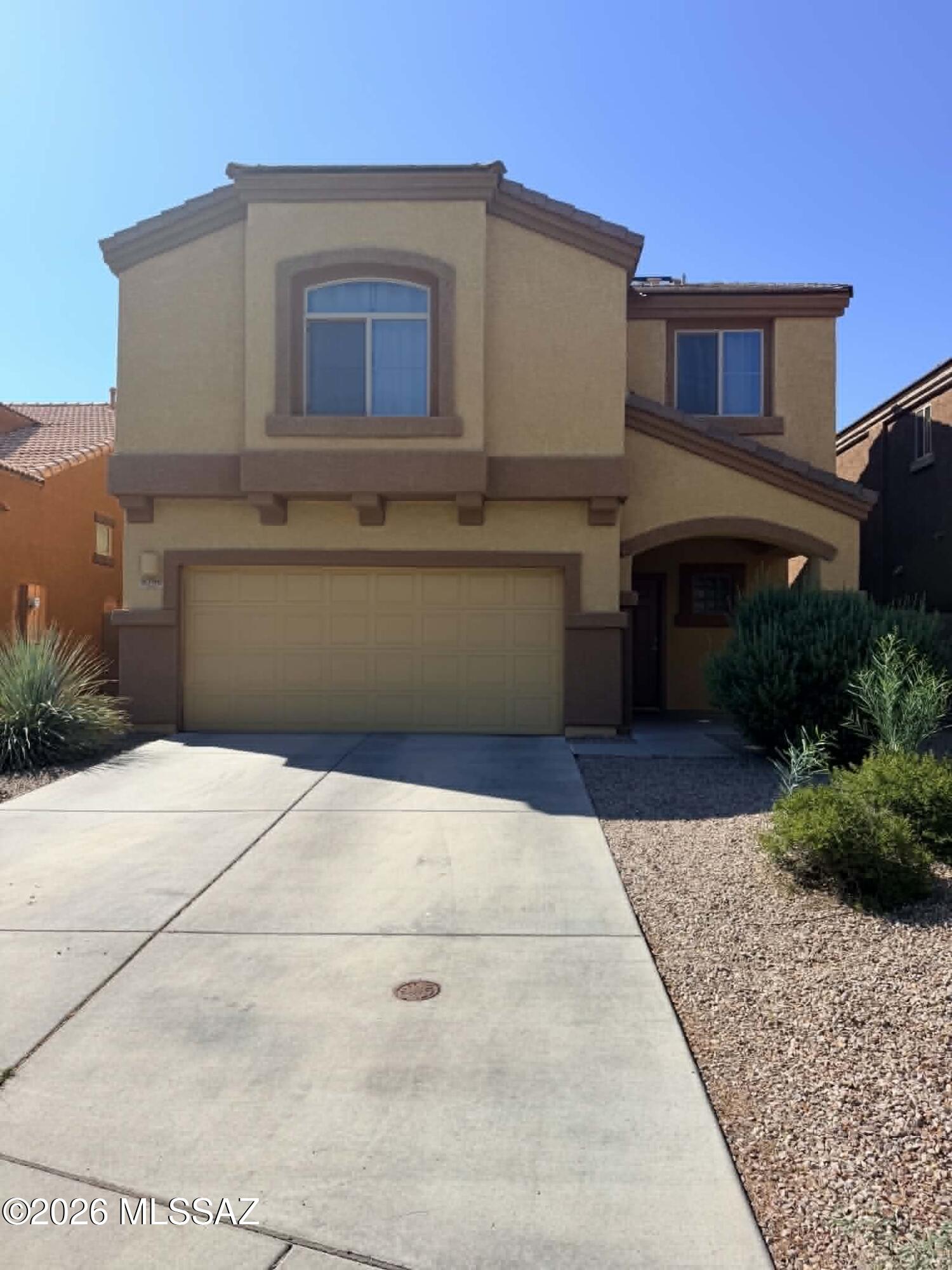 Spacious 4 bedroom, 3 bathroom home offering 2,301 sq. ft. of comfortable living in a desirable Tucson community. Designed with families in mind, this home features an open layout with multiple living spaces, including a large game room or office overlooking the golf course, perfect for work or relaxation. The kitchen includes a center island, pantry, and full appliance package with refrigerator, stove, microwave, and dishwasher. The primary suite is generously sized with room for a sitting area, along with a walk-in closet and double sink vanity. Enjoy tile and carpet flooring, ceiling fans, and central air conditioning for year-round comfort. Step outside to a fully finished backyard with space to relax or entertain, plus easy access to a nearby community pool. Solar panels as well!
