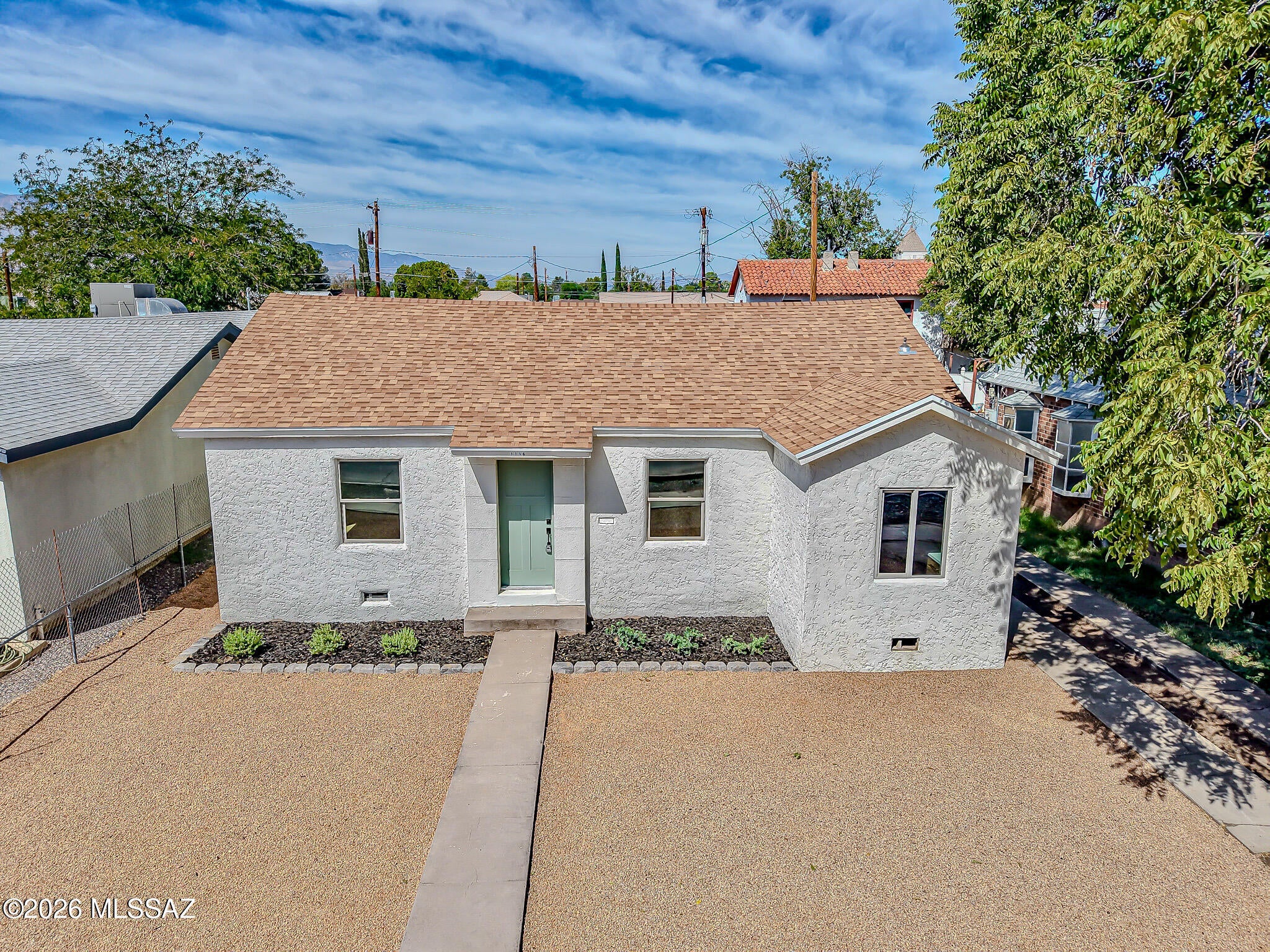 Up to 5% concessions offered with a FULL PRICE offer (That's $15,100!)This can be used for any and all lender approved costs, including a PERMANENT rate buy down to lower your payment.This fully remodeled 3 bedroom, 2 bath home with a versatile den retains the character of its 1945 roots while offering the comfort and convenience of an updated home. The renovation brings fresh, modern finishes throughout. The den provides extra space for a home office,sitting room, or playroom. Located in Safford's historic Avenues District near Safford Middle School, shopping, dining and everyday conveniences. A charming older home without the old house feel. Also zoned Multi-Family Residential to build more units for future income potential!