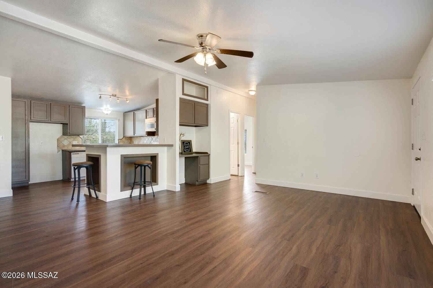 ***Range Pricing $250,000-$265,000. Seller willing to contribute towards Buyer's Closing Costs with offer at top end of range pricing ***. Enjoy wide-open space and beautiful mountain views in this move-in ready manufactured home situated on approximately 1 acre of flat, fully fenced land west of the Tucson Mountains. Located just minutes from Saguaro National Park West, this 3-bedroom, 2-bath home offers a peaceful desert setting with plenty of room to spread out. A great opportunity for those looking for space, views, and the freedom of an acre of land.
