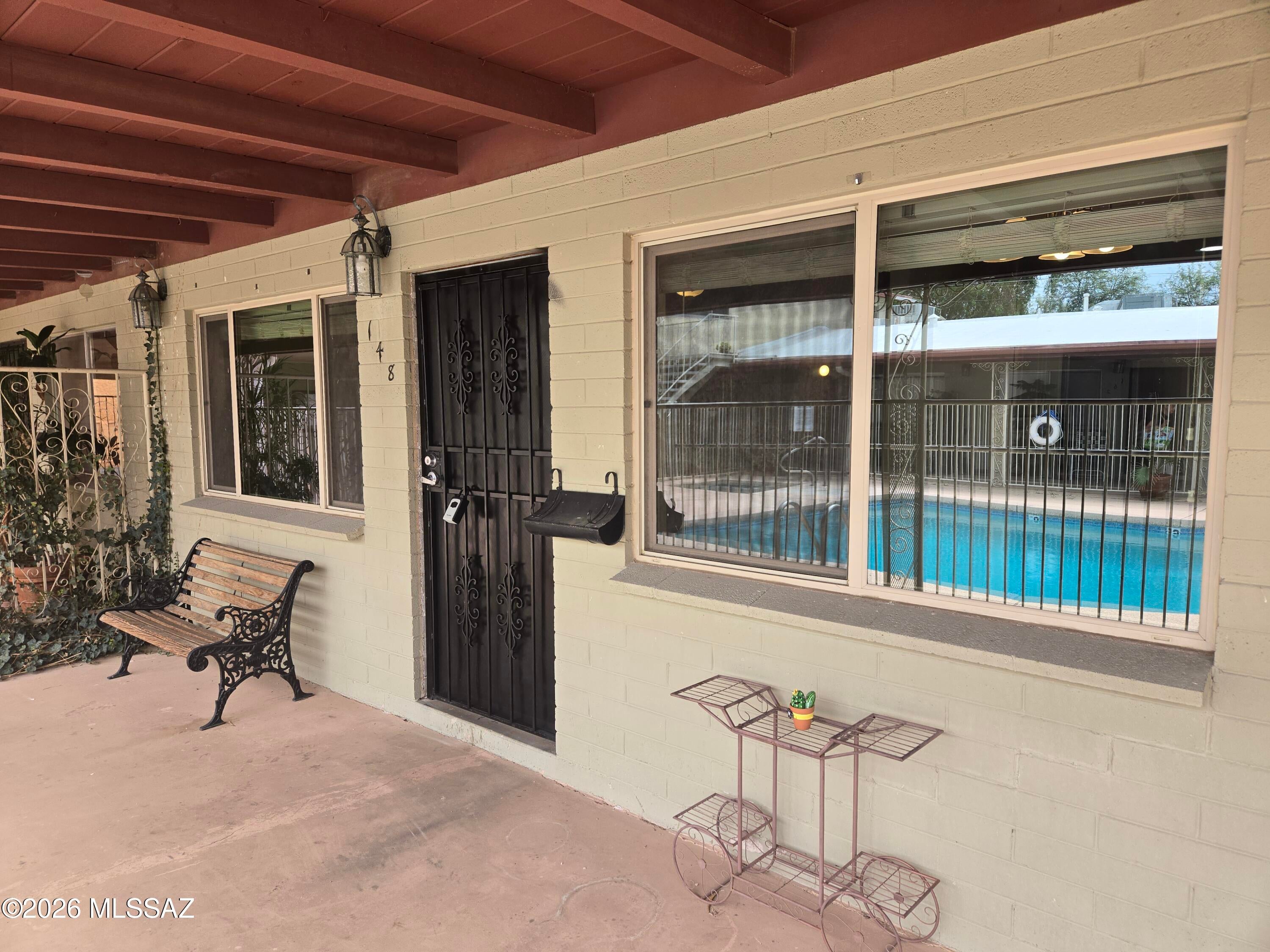 Prime central location in the Colonia Solana Historic District. Adjacent to Reid Park, U of A Baseball, Randolph Golf Course and steps from shops, restaurants, golf, tennis, the aquatic center and the zoo. Only 2 miles to UA and Downtown. Open and spacious with vaulted wood beamed ceilings. Completely remodeled interior with dual pane windows and tile flooring throughout. Large bedroom with 2spacious closet. Nice walk in shower and storage. Washer and Dryer, new Tankless Hot Water Heater. Stainless Steel appliances, new Dishwasher and Microwave. The community offers a pool and heated/spa.. The HOA includes pest control, exterior/common area maintenance, roof repairs, garbage, sewer, water and community laundry. Long terms rentals allowed.