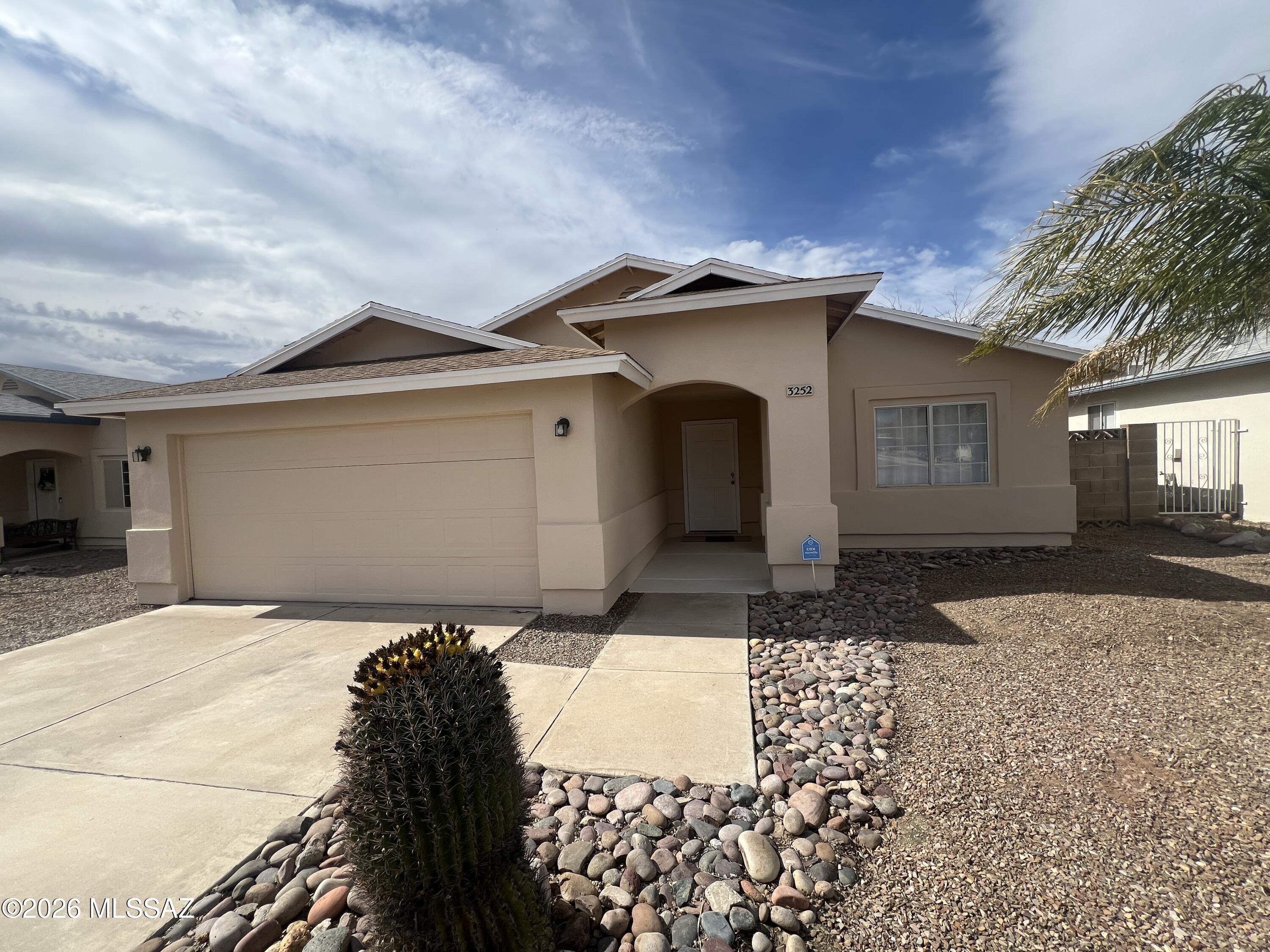 VAILABLE FOR QUICK POSSESSION! This attractive and comfortable 3 bedroom 2 bath home has an east side location that is convenient to everything. Amenities of this home include a large living room with vaulted ceiling & new carpet, a spacious kitchen with lots of cabinets & counter space and bay window breakfast nook, a split bedroom plan, and a nice size master bedroom with a master bath that has both a shower & a tub. In addition, this home has covered rear porch, a good size yard that backs up to an open desert strip,  and a 2 car garage. Please contact property managers for EZ access showings