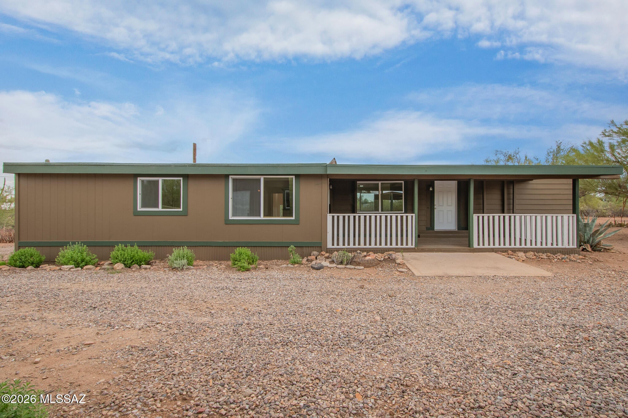 Seller to accept or counter offers between $309,900 - $324,900. Escape to your own Arizona mountain retreat! Set on a generous 1.1-acre lot, this spacious 3-bedroom, 2-bath home offers approximately 2,000 sq. ft. of comfortable living surrounded by stunning natural beauty. The property features a massive detached 2-car garage plus an additional 2-car carport, providing exceptional space for vehicles, toys, equipment, hobbies, or a workshop. With plenty of room to spread out, this property offers endless possibilities for outdoor living, gardening, recreation, storage, or future improvements. Enjoy the peace, privacy, and freedom of rural Arizona living while creating the retreat you've always envisioned!