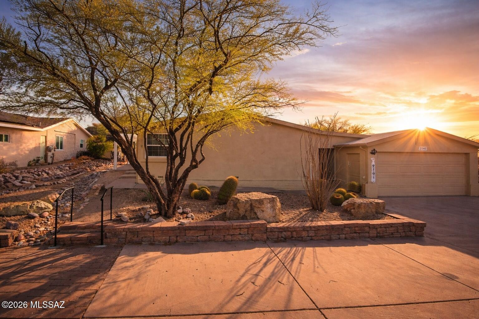 Welcome to this spacious, one-owner home at the base of the Tucson Mountain Range in the gated Tucson Estates community, surrounded by hiking and biking trails with direct access to Saguaro National Park West. This 3-bed, 2-bath home offers nearly 2,000 sq ft with an open layout, separate living and family rooms, and a split bedroom floor plan. All bedrooms feature walk-in closets for ample storage. The kitchen includes a gas range, island, lazy Susan, microwave, and refrigerator. Primary suite offers dual vanities with separate shower and tub. Enjoy an Arizona room, screened patio, mountain and sunset views, plus a 2-car garage. Community amenities include pickleball, tennis, trails, and rec center.