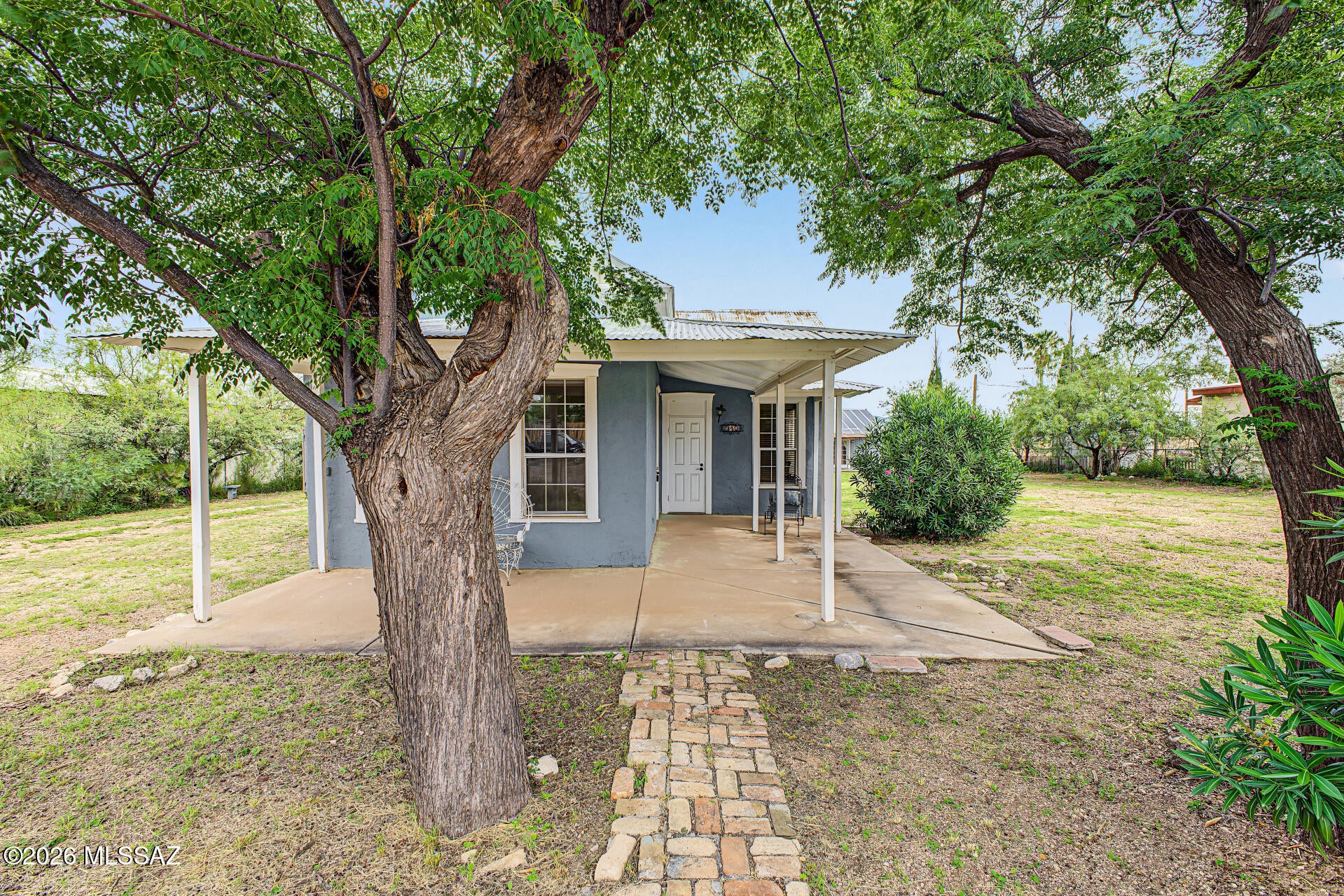 Historic Charm Meets Modern Opportunity in the Heart of Tombstone! This unique Tombstone property offers the perfect blend of historic character, modern updates, and incredible versatility. Situated on two lots, the property features a beautifully updated and furnished 1-bedroom, 1-bath main home with 905 sq. ft., plus a separate furnished 1-bedroom, 1-bath detached ADU with approximately 500 sq ft. -- ideal for guests, extended family, a private office or studio, or a potential short-term rental/Airbnb opportunity. The main home has been thoughtfully updated, including stainless steel appliances and modern improvements completed in 2023. The detached ADU offers additional living space and includes a small refrigerator and microwave. Previously operated as a short-term rental, the ADU provides an attractive opportunity for buyers seeking a turn-key property with potential income-producing flexibility. Major plumbing and electrical upgrades were completed in 2025, providing valuable peace of mind for the next owner. RV owners will appreciate the 50-amp RV hookup and dedicated RV dump station, adding even more functionality to this one-of-a-kind property. Whether you're looking for a full-time residence, a weekend getaway, a property with a separate guest house, or an investment opportunity in one of Arizona's most recognizable historic destinations, this property is move-in ready and offers options that are hard to find. Live in the main home, host guests in the ADU, create a multigenerational setup, or explore its potential as a short-term rental. With its prime location near the activity and attractions of historic Tombstone, this is a rare opportunity to own a versatile piece of Arizona history with modern-day possibilities.