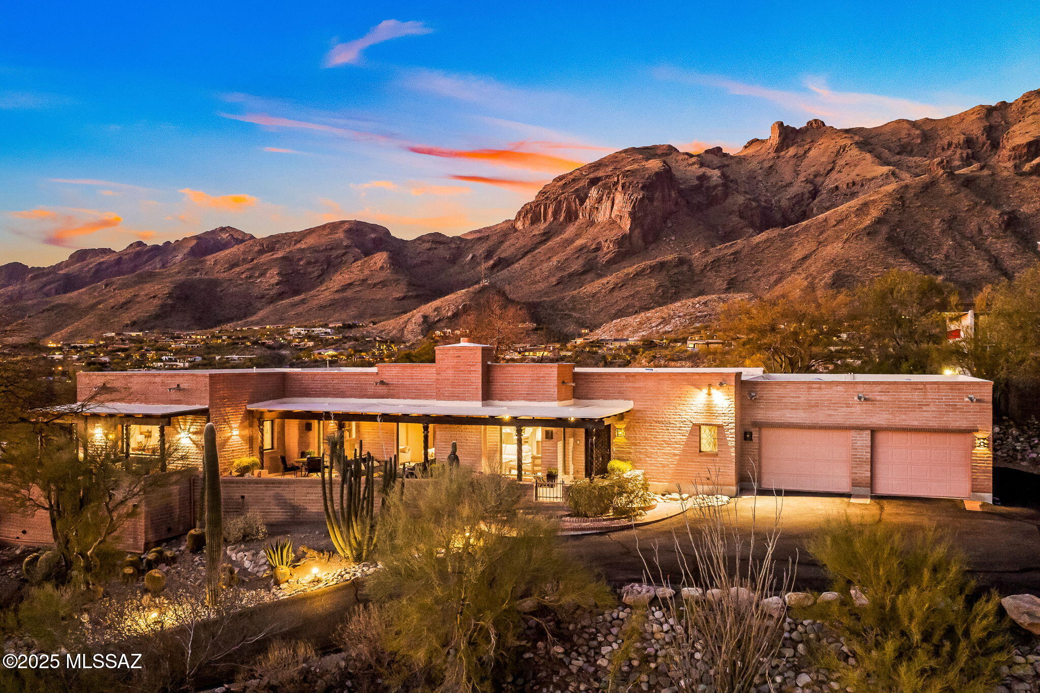 Stunning Hilltop Retreat in Foothills II Gated Community. Discover the pinnacle of luxury living with this fabulous 3-bedroom, 3-bathroom masterpiece perched high in the Tucson Foothills. Enjoy 360-degree panoramic views that stretch from the rugged beauty of the Santa Catalina Mountains to the sparkling city lights of Tucson. The open-concept great room is a showstopper, with oversized windows framing breathtaking scenery from every angle. With spacious living areas and an inviting design, this home effortlessly blends elegance with comfort. Nestled in one of Tucson's most prestigious gated communities, this property is perfect for those seeking privacy, sophistication, and natural beauty. A true gem that redefines hilltop living—don't miss the chance to call it home!
