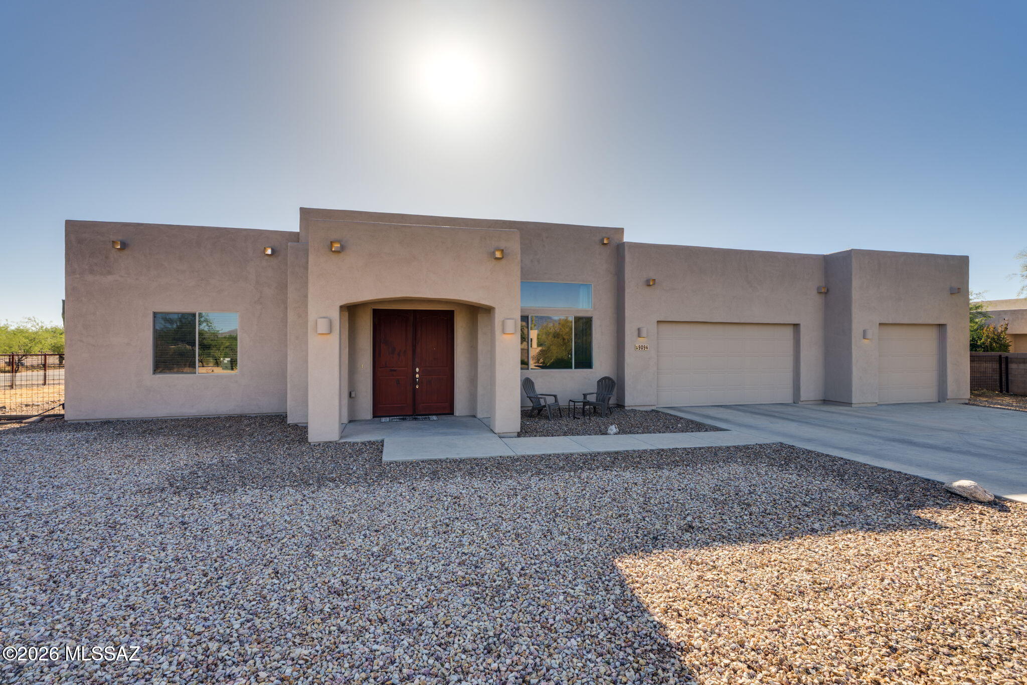 Bright and open 5-bedroom, 2.5-bath home with 2,627 sq ft on a .83-acre corner lot. Features a 3-car garage, high ceilings and tile throughout main living areas. Large great room with fireplace, office/den or 5th bedroom, and laundry with extra storage cabinets. Kitchen offers granite, stainless appliances, breakfast bar and pantry. Spacious primary suite includes backyard access, dual vanities, a large shower with multiple heads plus soaking tub. Enjoy mature trees, artificial turf and extended patio in your backyard. Located in The Award-Winning Vail School District.