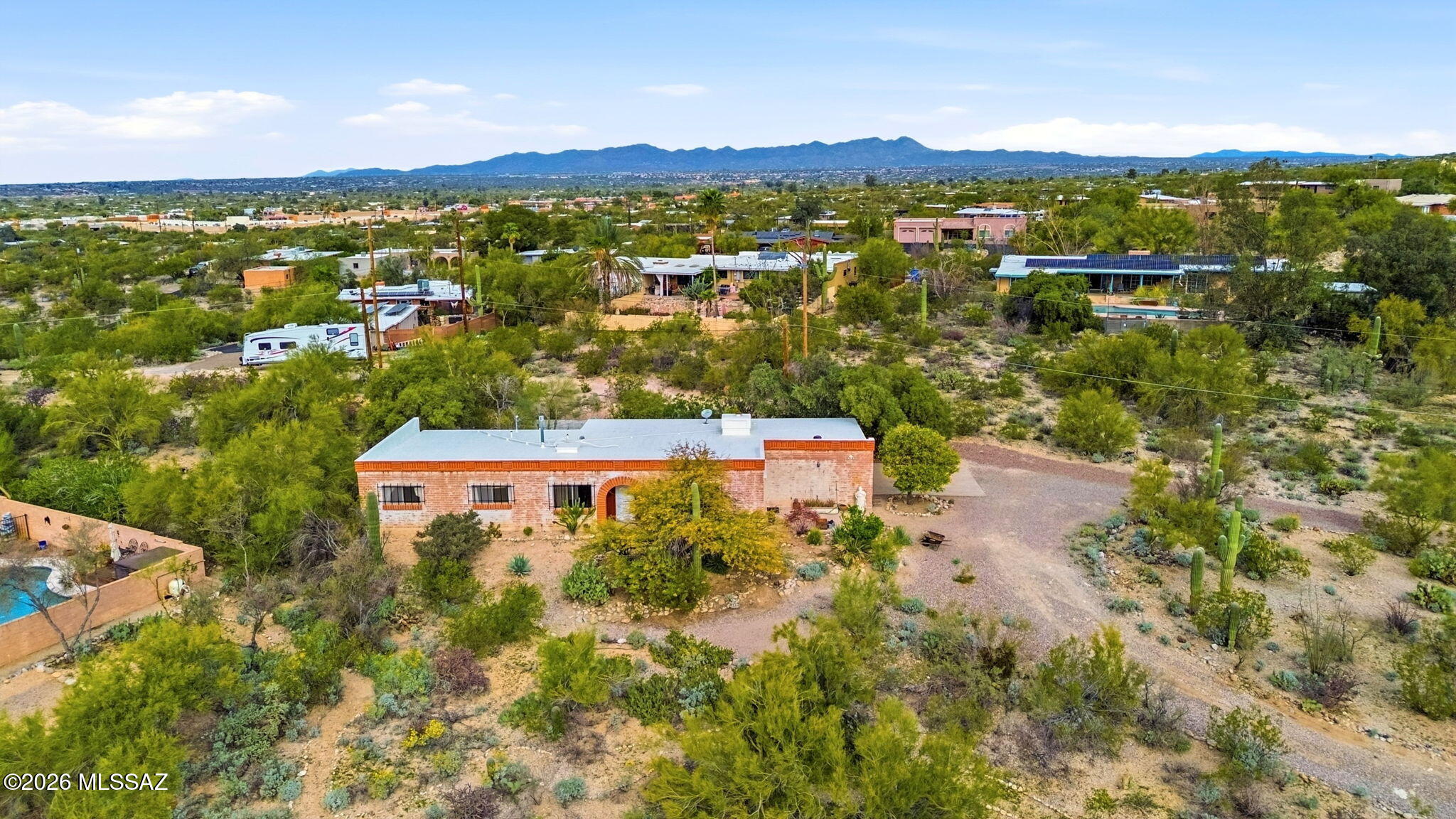 Welcome to your private desert sanctuary with breathtaking views and stunning sunrises and sunsets. This updated 3-bedroom, 2 -bath home features new concrete floors throughout, modern lighting, fresh paint, and thoughtful upgrades. The primary bathroom offers a new shower, and a brand-new HVAC system adds comfort and peace of mind. Nestled in a serene desert oasis, this must-see home blends style and nature beautifully.