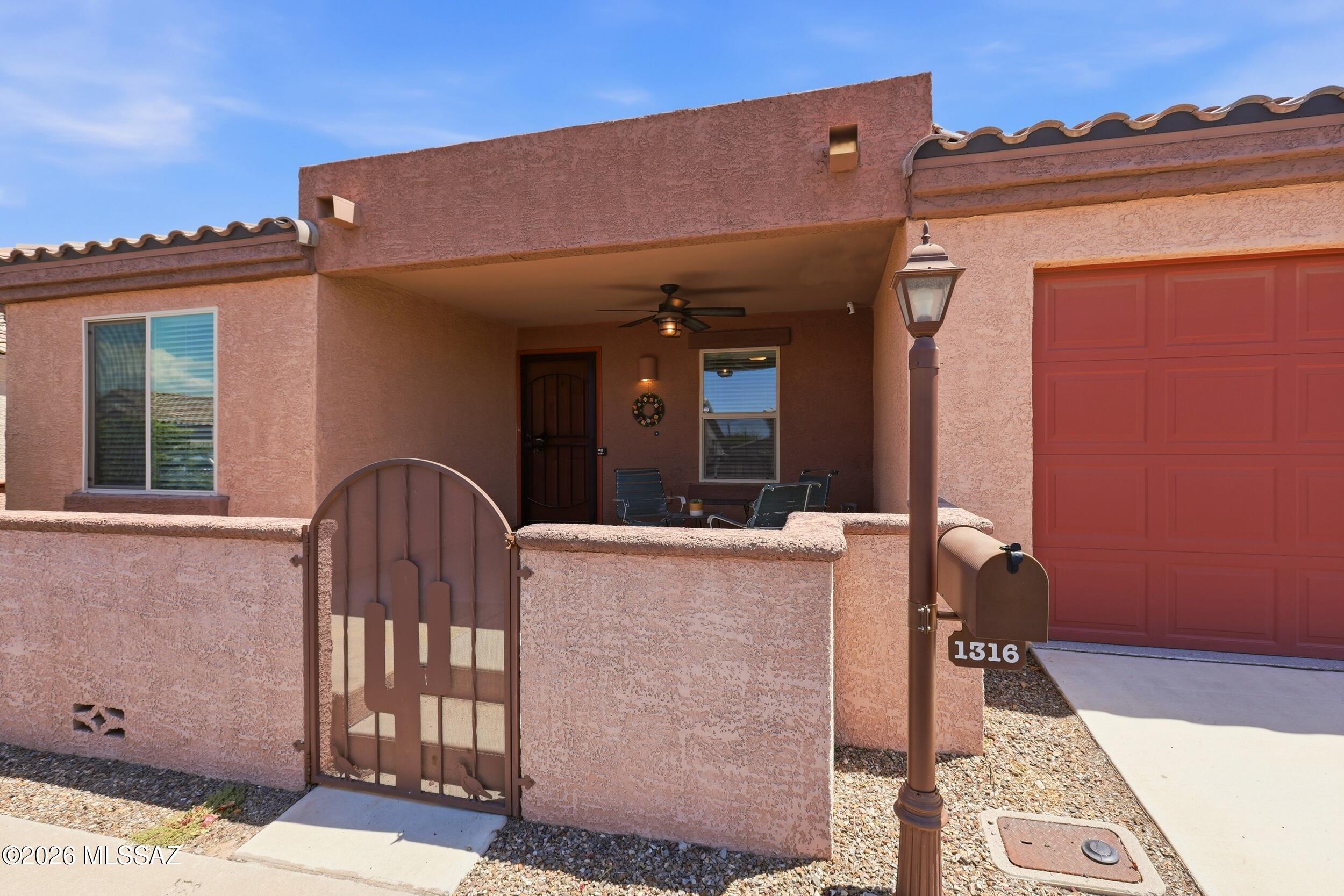 Welcome to effortless living in the highly sought-after Rancho Resort, Sahuarita's premier 55+ active adult community. This beautifully maintained 2-bedroom, 2-bathroom home with a versatile den offers 1,388 square feet of thoughtfully designed living space and is completely move-in ready.

Originally built by D.R. Horton, this home features a flexible den that's perfect for a home office, hobby room, or guest space. The open-concept floor plan creates an inviting atmosphere ideal for both everyday living and entertaining.

The owners have thoughtfully upgraded the home throughout, including an extended enclosed front patio, a custom front porch wall for added privacy and curb appeal, completed window treatments, ceiling fans and upgraded lighting throughout, a water softener, and nume finishing touches that make this home truly stand out.

The garage is equally impressive with epoxy flooring, overhead storage racks, automatic shop lighting, and additional electrical outlets, creating a clean, organized, and highly functional workspace with exceptional storage.

Located just moments from the Rancho Resort clubhouse, you'll enjoy convenient access to an abundance of resort-style amenities and activities designed for an active lifestyle. Whether you're looking for a full-time residence or a seasonal Arizona getaway, this beautifully upgraded home is ready for you to move in and start enjoying all that Rancho Resort has to offer.
