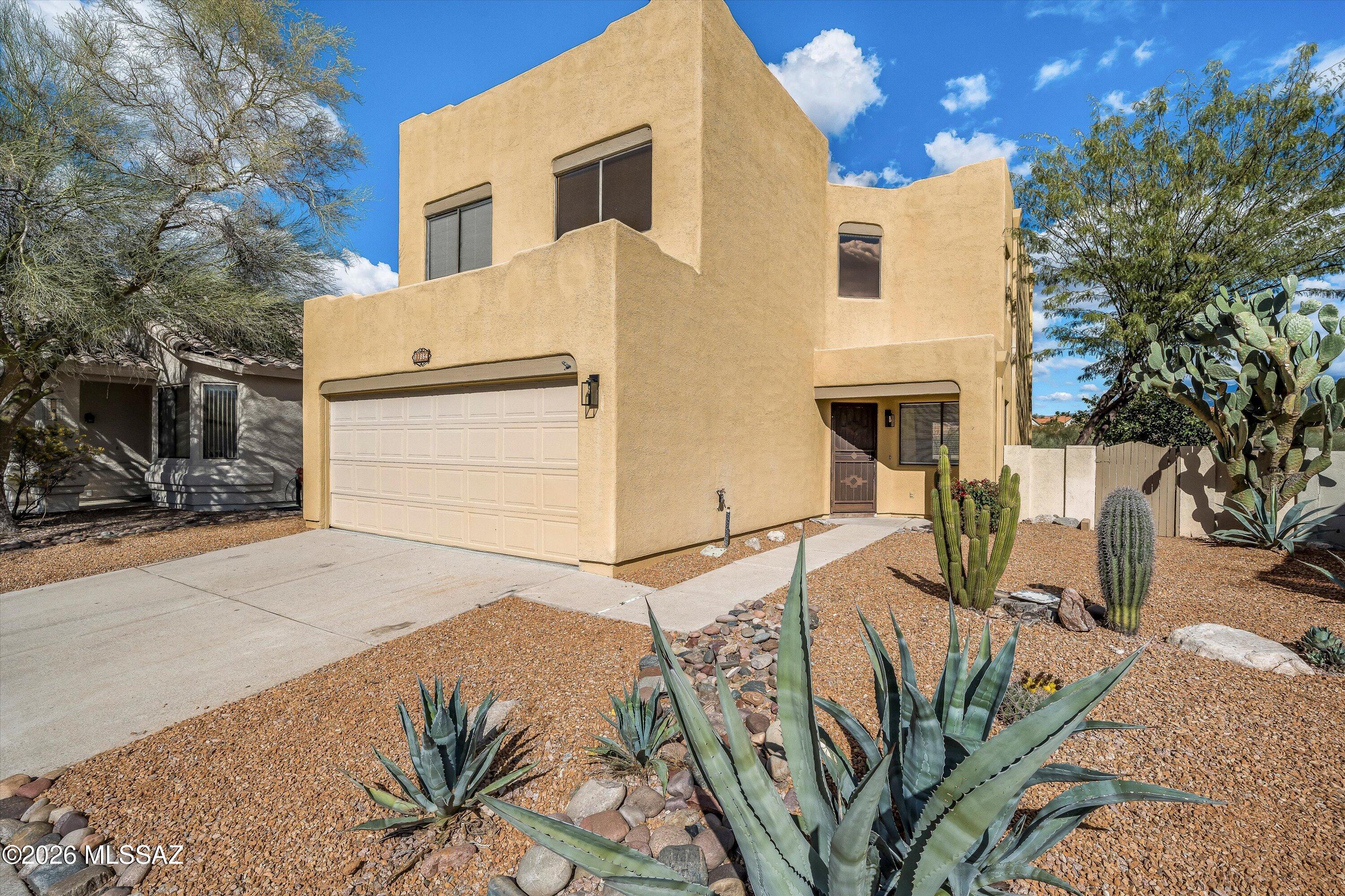 Discover your dream home, where modern luxury meets breathtaking natural beauty. Nestled on a private lot in Copper Creek, this fully remodeled residence offers stunning, unobstructed views of the Catalina Mountain Range.
Experience modern luxury and stunning Catalina Mountain views in this fully remodeled Copper Creek home. Enjoy a private lot, sparkling pool, and dramatic two-story entry opening to a light-filled family room. The updated kitchen features brand new cabinets, quartz counters, and ample storage. Throughout the home you'll find new fixtures, elegant flooring, and stylish doors. Relax in remodeled bathrooms with beautiful showers. Upstairs offers three spacious bedrooms and a master suite with a custom loft perfect as an office, library, or sitting area.